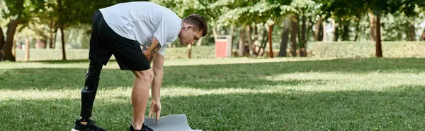 stock image man with disability exercising outside, showcasing strength and inclusivity in a lively park setting.