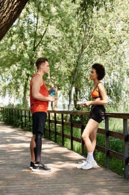 Two friends engage in a spirited outdoor workout, celebrating friendship and empowerment together. clipart