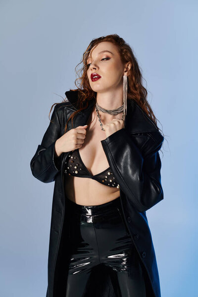 The confident woman exudes style in a daring outfit.