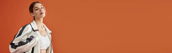 A beautiful athlete showcases her strength and passion just before a major sports event.