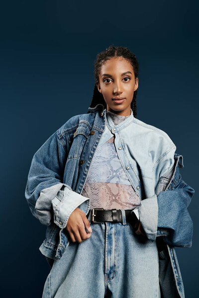 A young woman confidently models modern attire, highlighting her unique style and flair.