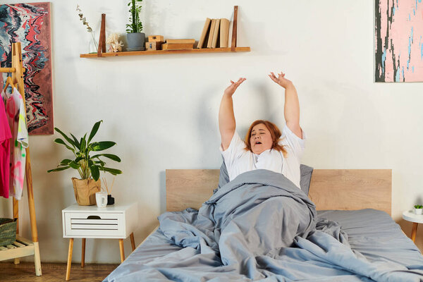 A beautiful plus size woman stretches in bed, enjoying a serene morning atmosphere.