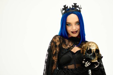 A beautiful young woman dressed in a Halloween outfit, showcasing a striking blue wig and crown. clipart