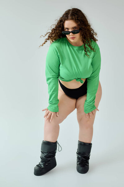 A stylish plus size woman showcases her bold fashion sense with confidence and flair.