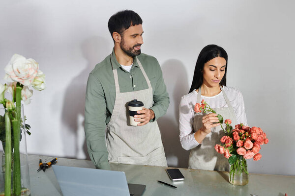 A couple lovingly tending to flowers in their lively florist shop, creating beautiful arrangements.