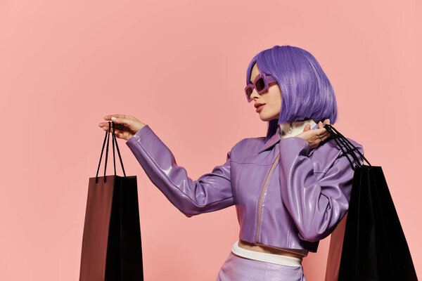 A fashionable woman with striking purple hair enjoys shopping while holding stylish bags in hand.