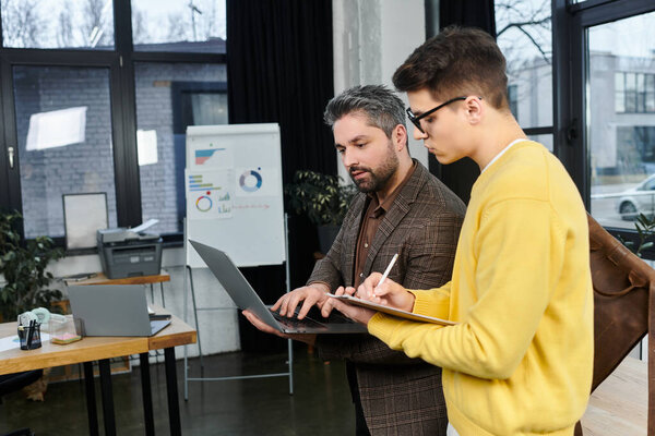 Two professionals engage in a productive discussion about onboarding tasks in a stylish office.