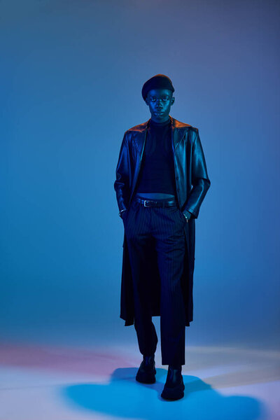 A young african american man confidently shows off his style in a vibrant setting.