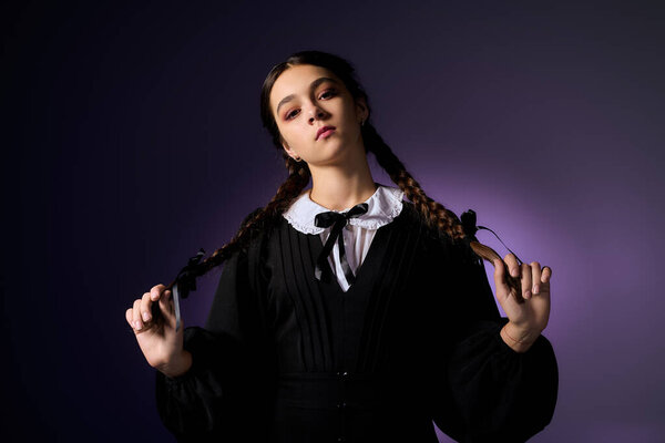 A young girl in a black gothic dress poses confidently, embodying a Wednesday character.