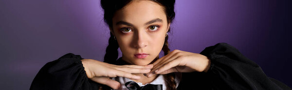 A girl with braids dressed in a gothic Wednesday outfit captures the Halloween spirit perfectly, banner