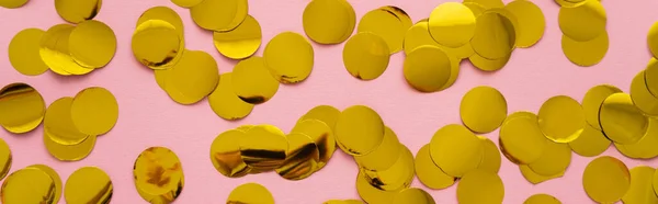 Top view of festive golden confetti on pink background, banner — Stock Photo