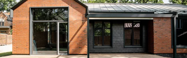 Modern cottage, housing trends design, brick walls, large panoramic windows, banner — Stock Photo