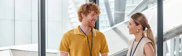 Two cheerful colleagues smiling and holding notebook and tea cup coworking, coworking, banner — Stock Photo