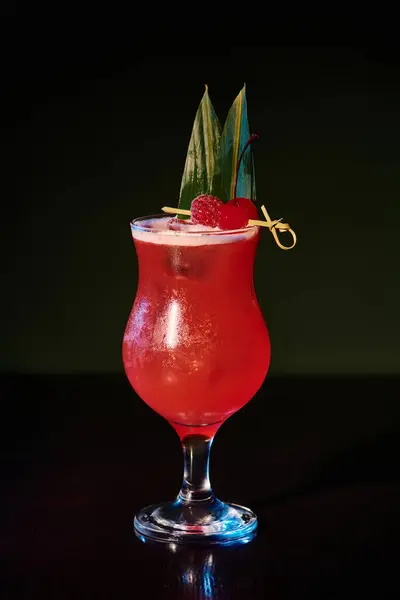 Esthetic singapore sling cocktail with fresh raspberries on black background, concept — Stock Photo