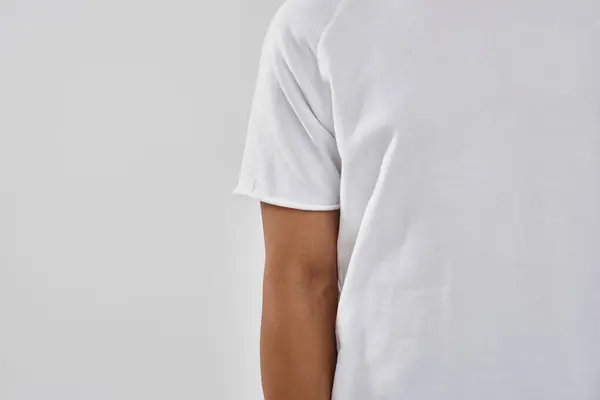 Fashionable african american male model in casual white t-shirt, copy space for advertising — Stock Photo