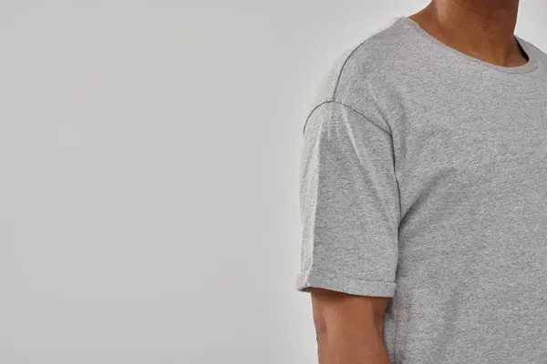 Fashionable young african american man wearing casual gray t-shirt, copy space for advertising — Stock Photo