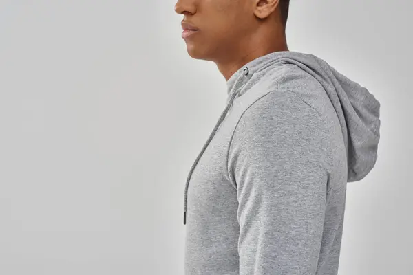 Elegant african american man in casual sweatshirt on white background, copy space for advertising — Stock Photo