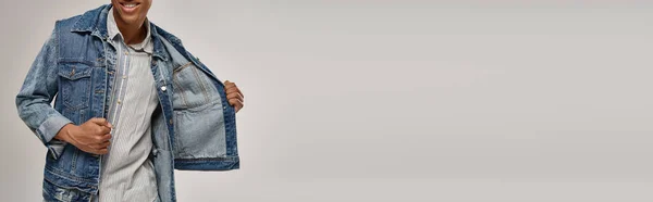 Cropped view of stylish african american man posing in trendy denim outfit, fashion concept, banner — Stock Photo