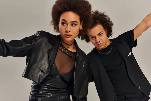 Fashionable african american siblings in urban stylish outfits posing together, family concept — Stock Photo