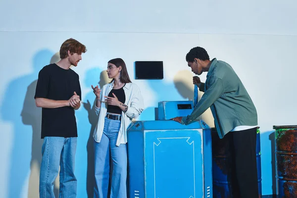 Young interracial friends chatting during quest in escape room, brainstorming and cooperation — Stock Photo