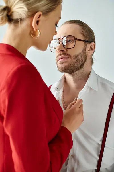 Good looking couple in chic attires posing in office and preparing to kiss lovingly, work affair — Stock Photo