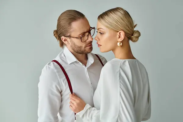 Sexy beautiful couple in elegant attires preparing to kiss lovingly while in office, work affair — Stock Photo