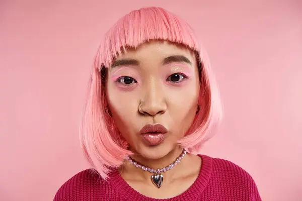 Close up lovely asian woman in 20s with nose piercing and pink hair surprising and looking to camera — Stock Photo