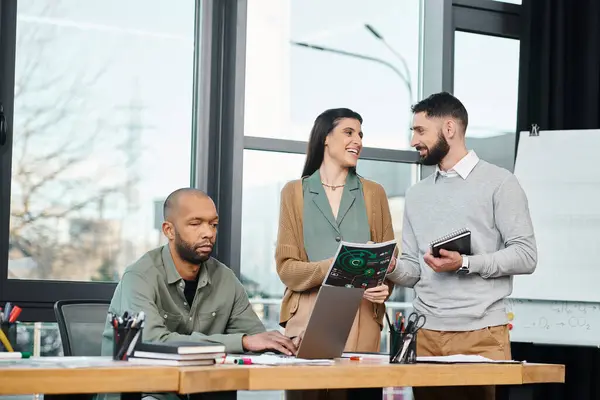 A group of professionals brainstorming and discussing a project around a sleek, modern office table, diversity and inclusion — Stock Photo