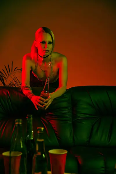 A woman relaxing on a couch in a room setting — Stock Photo