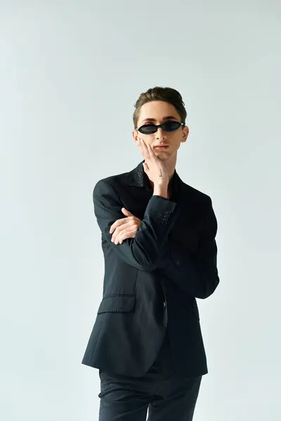 A young person exudes confidence and pride, styled in sleek fashion. — Stock Photo