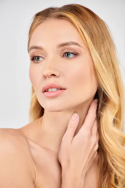 Woman standing peacefully, hands on neck — Stock Photo