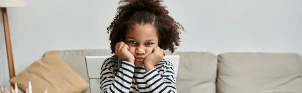 A little bored African American girl, looking at camera — Stock Photo