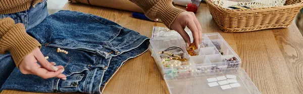 Young woman upcycles jewelry in eco-conscious process. — Stock Photo