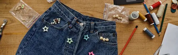 Jeans adorned in colorful stars. — Stock Photo