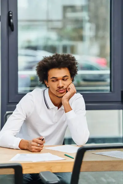 Young man at desk, job interview. — Stock Photo