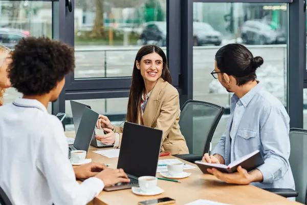 Job seekers collaborating with laptops at table. — Stock Photo