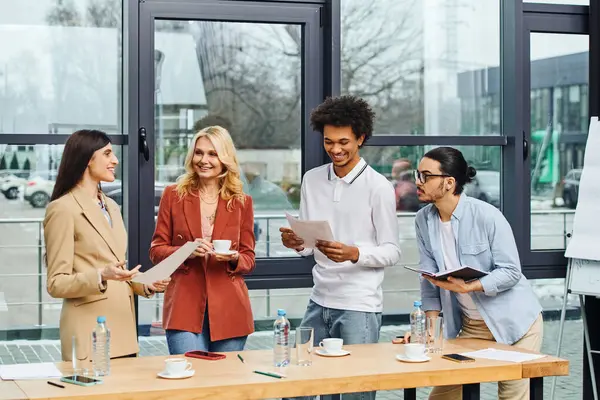 Job seekers in business attire gathered around table in office. — Stock Photo