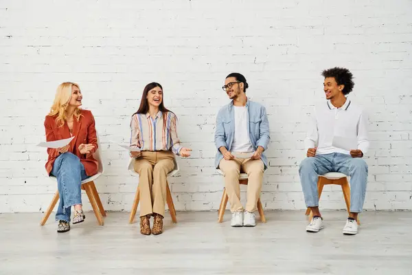 Group of people seated, engaged in lively discussion. — Stock Photo