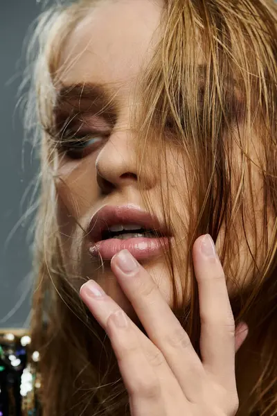 Close-up of a young woman with wet hair. — Stock Photo
