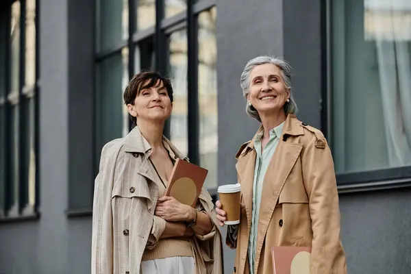 Elegant lesbian couple walking together. — Stock Photo