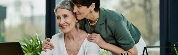 Two women lovingly embracing in warm hug. — Stock Photo