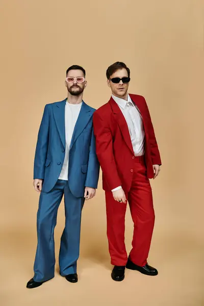 Two men in elegant suits stand side-by-side, showcasing their love for each other. — Stock Photo