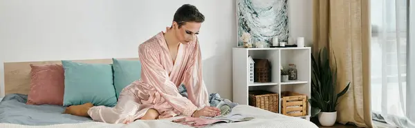 A glamorous drag queen poses confidently in a chic bedroom. — Stock Photo