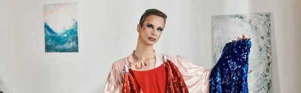 Attractive young drag queen poses elegantly with a dazzling outfit. — Stock Photo
