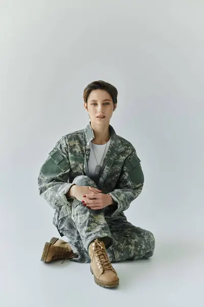 A soldier in camouflage prepares to leave on duty — Stock Photo
