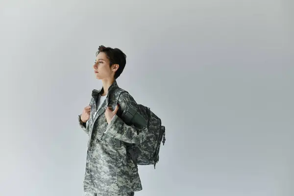 A soldier farewell moment in studio setting, capturing honor and commitment. — Stock Photo