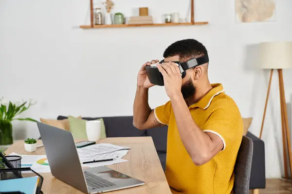 A man wearing a headset immerses himself in a virtual reality adventure. — Stock Photo