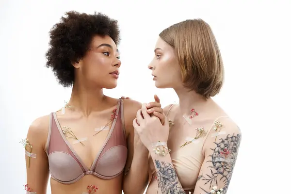 A tender connection unfolds as two women share an intimate glance. — Stock Photo
