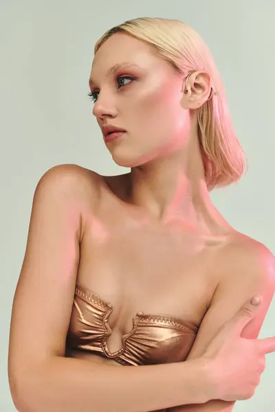 A young woman showcases her unique fashion sense with captivating holographic details. — Stock Photo