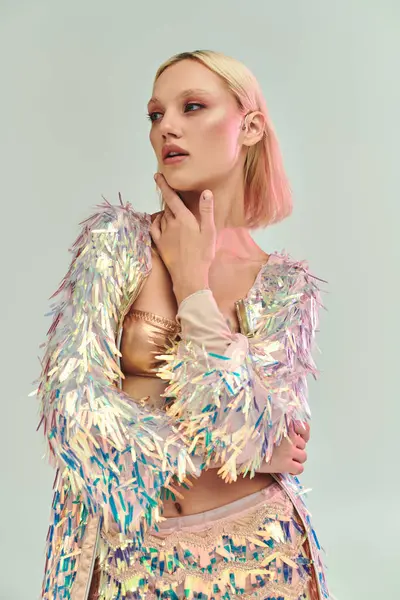 A young woman showcases her trendy, iridescent outfit with poise. — Stock Photo
